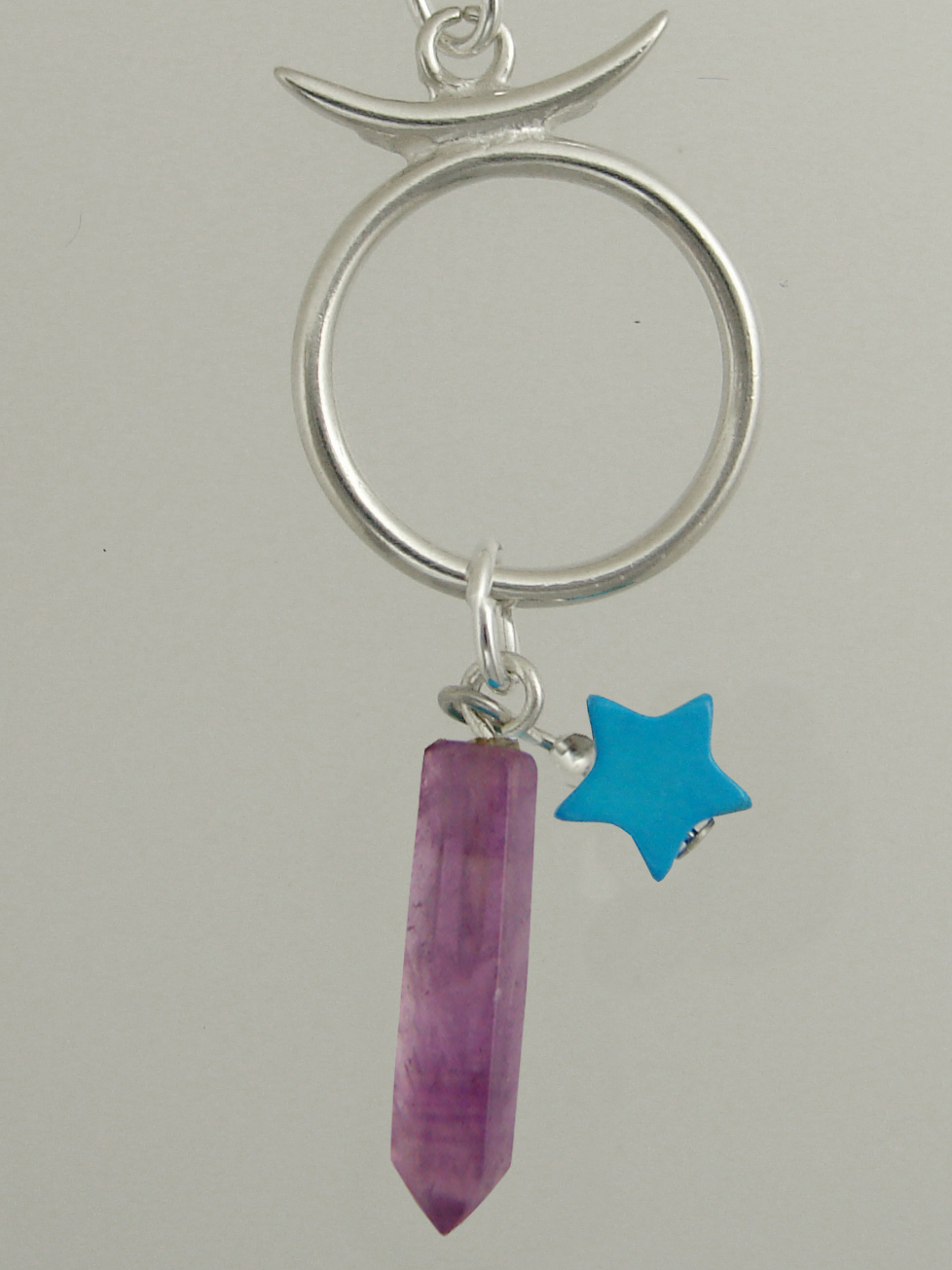 Sterling Silver Taurus Pendant Necklace With an Amethyst Crystal And a Turquoise Star